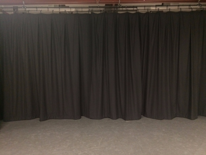 Before & After - Mascalls Academy - After - new stage curtains creating a clear workspace