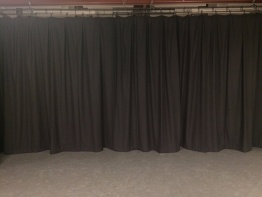 After - new stage curtains creating a clear workspace